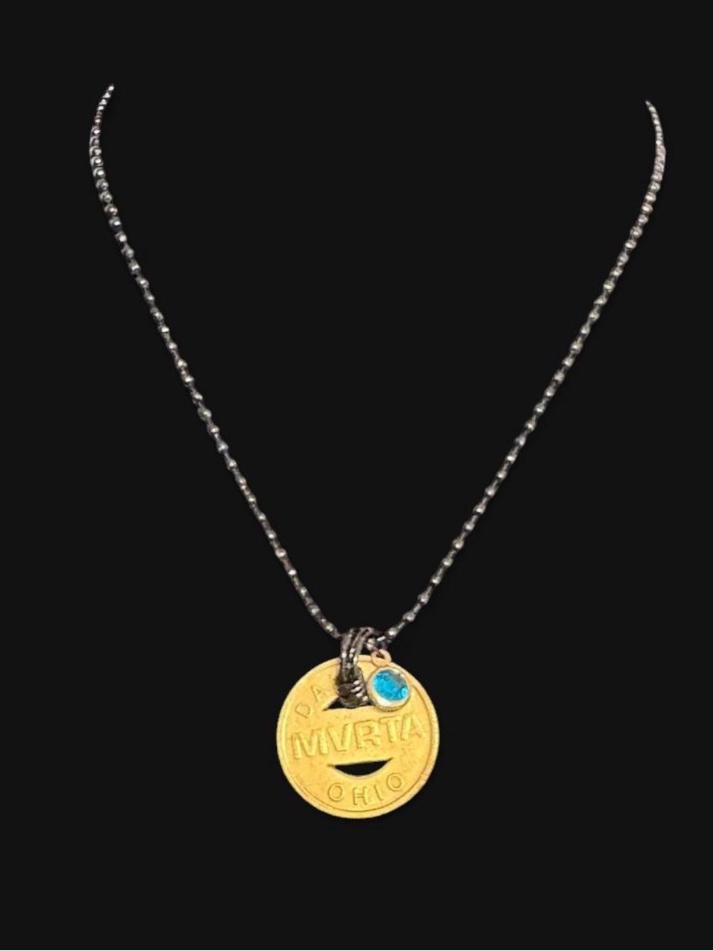 Vintage Ohio Daytona MVRTA coin necklace with blue gemstone accent
